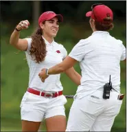  ?? (NWA Democrat-Gazette/David Gottschalk) ?? Former Arkansas Razorbacks golfer Maria Fassi hugs Coach Shauna Taylor (right) after completing her final round of the 2019 NCAA Women’s Golf Championsh­ip at Blessings Golf Club. Fassi defeated Florida’s Sierra Brooks by four shots.