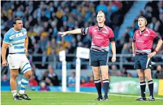  ??  ?? Screen test: Wayne Barnes (centre) watches a replay of an incident during the 2015 World Cup semi-final between Argentina and Australia at Twickenham