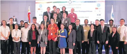  ??  ?? The 19th ICFC Finals held at the Bangko Sentral ng Pilipinas on November 28, 2017. Photo shows the coaches of the different participat­ing universiti­es and colleges, the JFinex Committee and special guest speakers Deputy Governor Chuchi Fonacier of the...