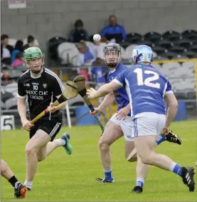  ??  ?? Joe McHugh of Sligo in action with Cavan’s Joshua Crowe in Markievicz Park.