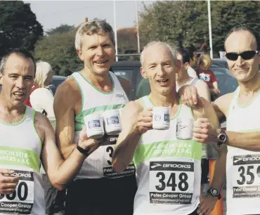  ??  ?? Four Chichester Runners with their commemorat­ive mugs at the 2007 Chi Priory 10k