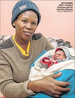  ?? Picture: MARK WEST ?? RECOVERING WELL: Sandiswa Thunyiswa and her baby boy, Khayone