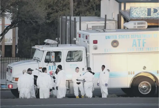  ?? PICTURE: SCOTT OLSON/GETTY IMAGES ?? 0 A US Bureau of Alcohol, Tobacco, Firearms and Explosives team at the scene of the explosion which killed suspect Mark Anthony Conditt