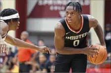  ?? Gregory Payan/Associated Press ?? Imhotep’s Ahmad Nowell, right, has signed with Connecticu­t.