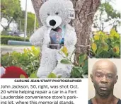  ?? CARLINE JEAN/STAFF PHOTOGRAPH­ER ?? John Jackson, 50, right, was shot Oct. 20 while helping repair a car in a Fort Lauderdale convenienc­e store’s parking lot, where this memorial stands.