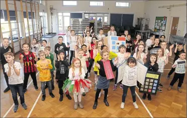  ?? 28608304 ?? Classes dancing to the BBC Supermover­s during the NSPCC Day and mathematic­al marathon at East Farleigh Primary School