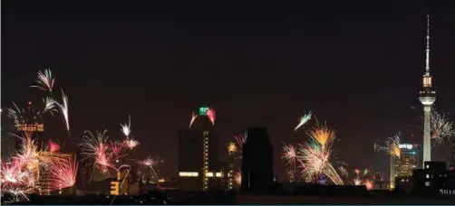  ??  ?? Fireworks is seen over the city skyline with the landmark TV tower AE as the German capital celebrates the arrival of a new year in Berlin.