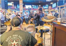  ?? RACHAEL PACELLA/CAPITAL GAZETTE ?? Rebel Soul plays a set during the Thanks-Gavin fundraiser Wednesday at The Greene Turtle in Annapolis. The event was held to honor Gavin Payne, who died earlier this year in a motor vehicle crash.