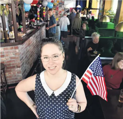  ?? PHOTO: GREGOR RICHARDSON ?? Cliffhange­r . . . US citizen Jade De La Paz (35) at a US election function yesterday.