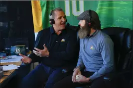  ?? JOSE CARLOS FAJARDO — BAY AREA NEWS GROUP ?? Oakland A’s television play-by-play announcer Glen Kuiper, left, was fired Monday, 17days after using a racial epithet on the air leading into an A’s broadcast on May 5in Kansas City.