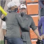  ?? KEVIN C. COX/ GETTY IMAGES ?? Head coach Bruce Arians, right, and offensive coordinato­r Byron Leftwich led Tampa Bay to a convincing win in Super Bowl 55.