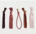  ??  ?? Oysho 5 Copper Hair Ties Rp.129.000