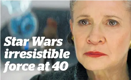  ?? Picture / AP ?? Carrie Fisher’s final performanc­e as Leia in The Last Jedi has been a big emotional drawcard for movie fans.