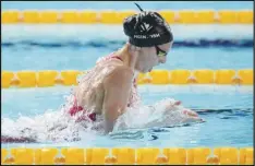  ?? Associated Press ?? Summer McIntosh, of Canada, competes in the Women’s 400 meters individual medley final during the Commonweal­th Games on Friday at the Sandwell Aquatics Centre in Birmingham, England. McIntosh, 15, won the race in an event record 4 minutes, 29.01 seconds.