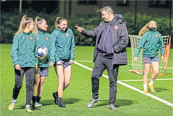  ?? ?? TALKING TACTICS: DUFC Women’s manager Graeme Hart at Gussie Park preparing his players for tomorrow’s big game. Picture by Steve Brown.