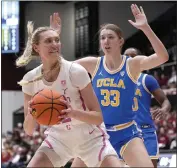  ?? THEARON W. HENDERSON – GETTY IMAGES ?? Stanford’s Cameron Brink, who scored 19 points, backs in against Amanda Muse of UCLA during Sunday’s game.