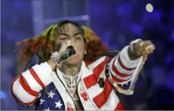  ?? LUCA BRUNO — THE ASSOCIATED PRESS FILE ?? Daniel Hernandez, known as Tekashi 6ix9ine, performs during the Philipp Plein women’s 2019 Spring-Summer collection, unveiled during the Fashion Week in Milan, Italy.