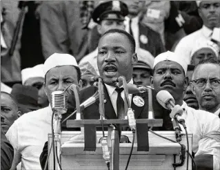  ?? AP FILE ?? Dr. Martin Luther King Jr. addresses marchers during his “I Have a Dream” speech at the Lincoln Memorial on Aug. 28, 1963, in Washington, D.C. Two civil rights leaders decry any attempt to return to the tactics the FBI used to attempt to discredit King and other human rights activists.