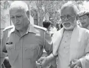  ??  ?? Aseemanand being produced in court. He was acquitted, along with six others, in Ajmer Sharif blast case. HT FILE