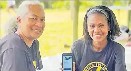  ?? Picture: SUPPLIED ?? Sole risk management and regulatory compliance consultant Christina Rokoua, left, presents the Sole app in Dawasamu, Tailevu.