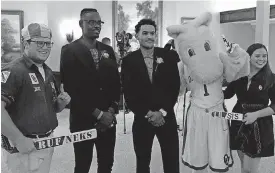  ?? [PHOTO BY ERIK HORNE, THE OKLAHOMAN] ?? Former Thunder guard Anthony Morrow, second from left, poses with OU guard Trae Young, third from left, at the March of Dimes Sports Headliners Banquet on Friday at the Oklahoma City Golf and Country Club.