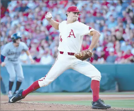  ?? Special to The Sentinel-Record/Craven Whitlow ?? SMOOTH RELIEF: Arkansas junior left-hander Jake Reindl allowed only one run on five hits in seven innings of relief Sunday as the Razorbacks defeated Dallas Baptist, 4-3, to win the Fayettevil­le Regional and advance to host a super regional this week.