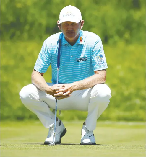  ?? Mark Blinch / Gett y Imag es ?? Brandt Snedeker looks over a putt on the ninth green in the second round of the RBC Canadian Open.