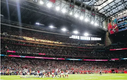  ?? KEVIN C. COX / GETTY IMAGES FILE ?? Houston’s NRG Stadium, the NFL’s first retractabl­e-roof stadium, was built at the turn of the century at a cost of $449 million, including $193 million in public funds. It was used as a flood refuge last week.