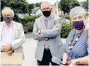  ?? TIM KROCHAK • CHRONICLE HERALD ?? From left, Mahone Bay Mayor David Devenne, Berwick Mayor Don Clarke and South Shore-St. Margarets MP Bernadette Jordan attend a funding announceme­nt for community solar gardens in Mahone Bay on July 8.