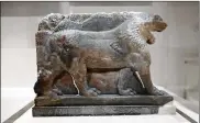  ?? NATASHA LIVINGSTON­E / ASSOCIATED PRESS ?? A 3-D printed recreation of the ancient Lion of Mosul, which was destroyed by the Islamic State group at the Mosul Museum in Iraq, is displayed as part of an exhibition at the Imperial War Museum in London on Wednesday.