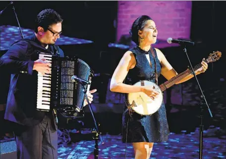  ?? Jason Kempin Getty Images for Americana Music Associatio­n ?? FRANCESCO TURRISI and Rhiannon Giddens, at the 2019 Americana Honors and Awards, are a couple profession­ally and romantical­ly.