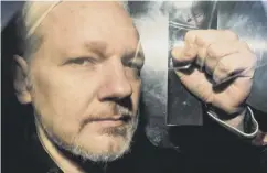  ??  ?? 0 Julian Assange is arrested at the Ecuadorian embassy