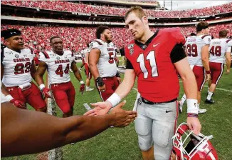  ?? CURTIS COMPTON / CCOMPTON@AJC.COM ?? Quarterbac­k Jake Fromm, who is 28-6 as UGA’s starter, has only one loss against an opponent not ranked in the top 15 — this past Saturday’s upset by South Carolina.