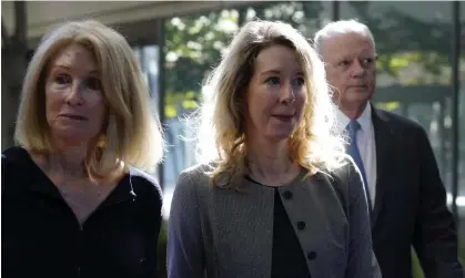  ?? ?? Elizabeth Holmes with her parents, Noel and Christian, as they arrive in court on 1 September. Photograph: Jeff Chiu/AP