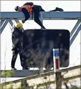  ?? ?? PROTEST: A gantry on the M25 in Essex