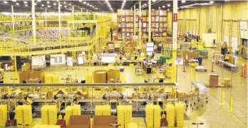  ?? CONTRIBUTE­D PHOTO ?? Amazon.com operates two fulfillmen­t centers in the Lehigh Valley — in the 800-acre Chrin Commerce Centre in Palmer Township off the new Route 33 interchang­e and the 1 million-square-foot warehouse complex in Breinigsvi­lle, Upper Macungie Township.