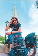  ??  ?? Vlad Belozerov 21-year-old rides 9,800 kilometres over six months to reach Dubai from Russia on a foot bike.