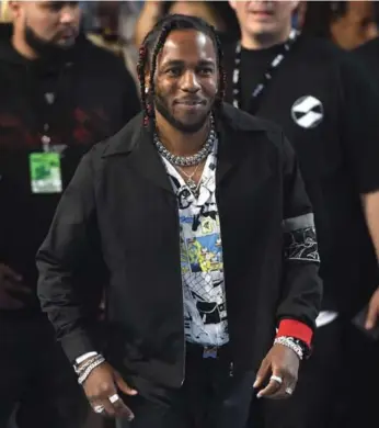  ?? CHRIS PIZZELLO/INVISION/THE ASSOCIATED PRESS FILE PHOTO ?? Nike expanded its Cortez campaign by hiring rapper Kendrick Lamar to be its pitchman.