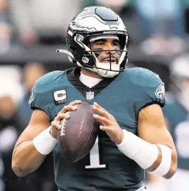  ?? MATT ROURKE AP ?? Eagles quarterbac­k Jalen Hurts’ rookie deal allowed the team to trade for A.J. Brown.