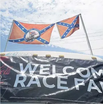  ?? PHELAN M. EBENHACK/AP ?? Confederat­e flags, here at Daytona Internatio­nal Speedway, will not fly on top of a motor homes at NASCAR tracks.