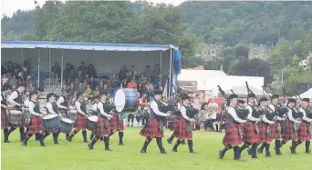  ??  ?? Traditiona­l The sounds of pipes and drums were there for all to enjoy