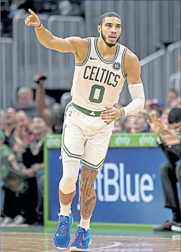  ?? STUART CAHILL / BOSTON HERALD FILE ?? Celtics forward Jayson Tatum and guard Carsen Edwards will not travel with the team for tonight’s tilt against the 76ers in Philadelph­ia.