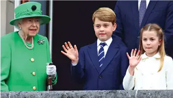  ?? ?? Attending the funeral: The Queen’s great-grandchild­ren, George and Charlotte