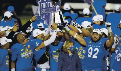  ?? JOHN LOCHER — THE ASSOCIATED PRESS ?? San Jose State players celebrate Dec. 19 after defeating Boise State for the Mountain West Conference championsh­ip in Las Vegas. The Spartans are set to play Ball State now at the Arizona Bowl in Tucson on New Year’s Eve.