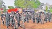  ?? AFP ?? Officials carry the coffin of one of their colleagues killed in the Maoist ambush.