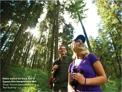  ?? Photo: Tourism Saskatchew­an/ Paul Austring ?? Hikers explore the Great Trail at Cypress Hills Interprovi­ncial Park.