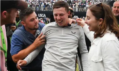  ?? Photograph: Amanda Sabga/EPA ?? Matt Fitzpatric­k (centre) is congratula­ted by his brother, Alex, after winning the US Open at Brookline.