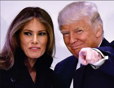  ??  ?? Big day ahead: Donald Trump and wife Melania in Washington yesterday