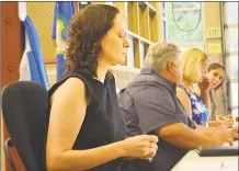  ?? Cassandra Day / Hearst Connecticu­t Media ?? Haddam Selectwoma­n Melissa Schlag is being vilified for calling Haddam “fascist and racist” at the end of Monday night’s Board of Selectmen’s meeting, where dozens protested Schlag’s kneeling during the Pledge of Allegiance.