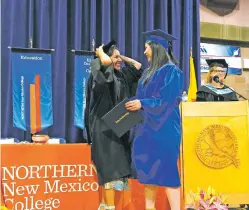  ?? COURTESY PHOTO ?? Twenty years after earning her associate degree from Northern New Mexico College in May 2003, Board of Regents Vice President Erica Rita Velarde presented her daughter Devina Gonzales with her associate degree at Northern’s spring 2023 commenceme­nt ceremony May 13. They are the first two women in their family to earn a college degree. “I’m so blessed to be able to give Devina her degree. That’s like the coolest memory,” Velarde said.